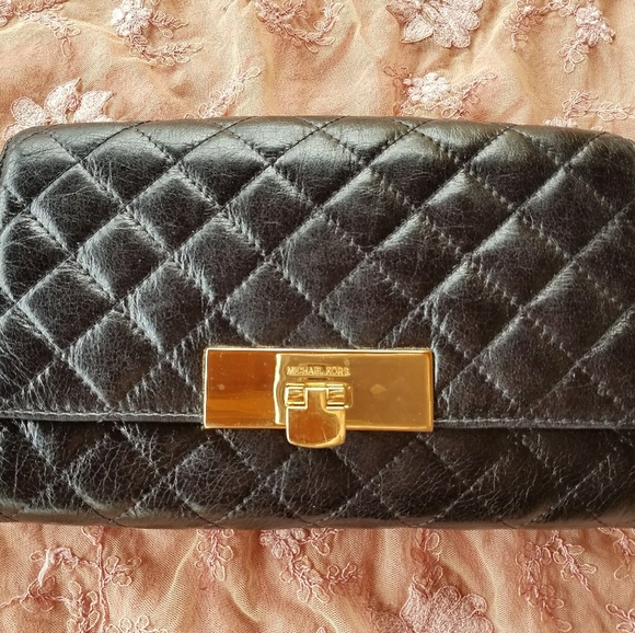 Michael Kors Handbags - Michael Kors Black Leathsr Quilted Clutch Bag
